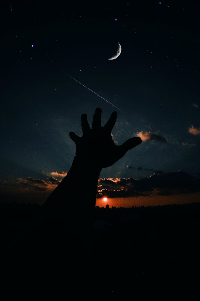 Hand night sunset
