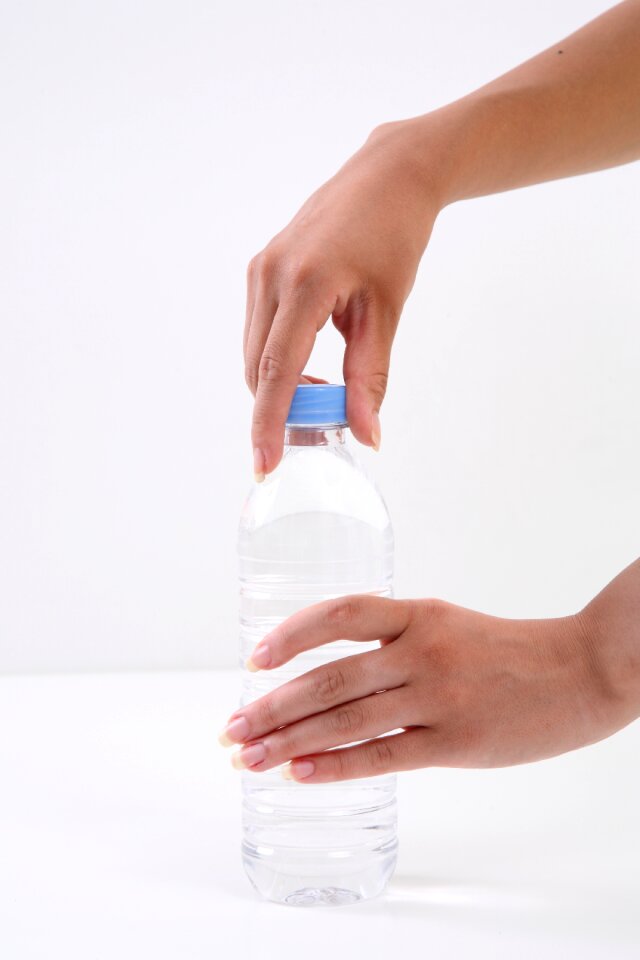 Hands pet bottle water