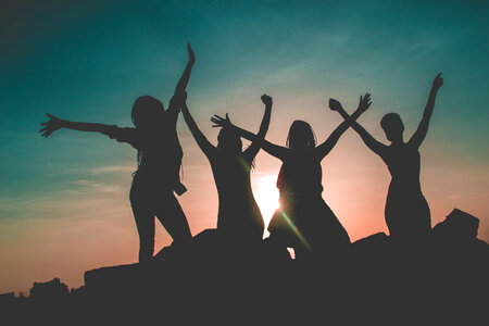 Silhouette girls sunset