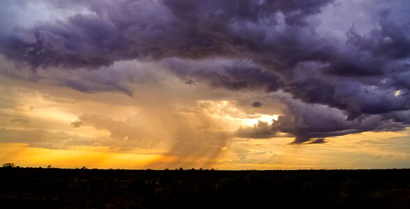 Sunset rain dark clouds photo