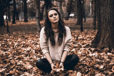 Woman fallen leaves
