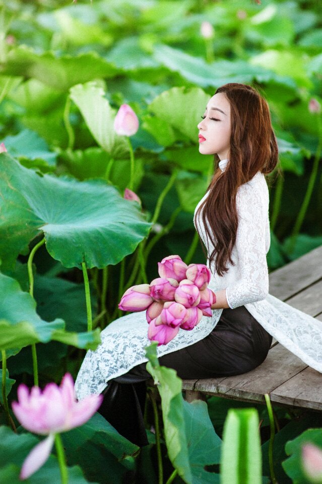 Woman girl ao dai lotus