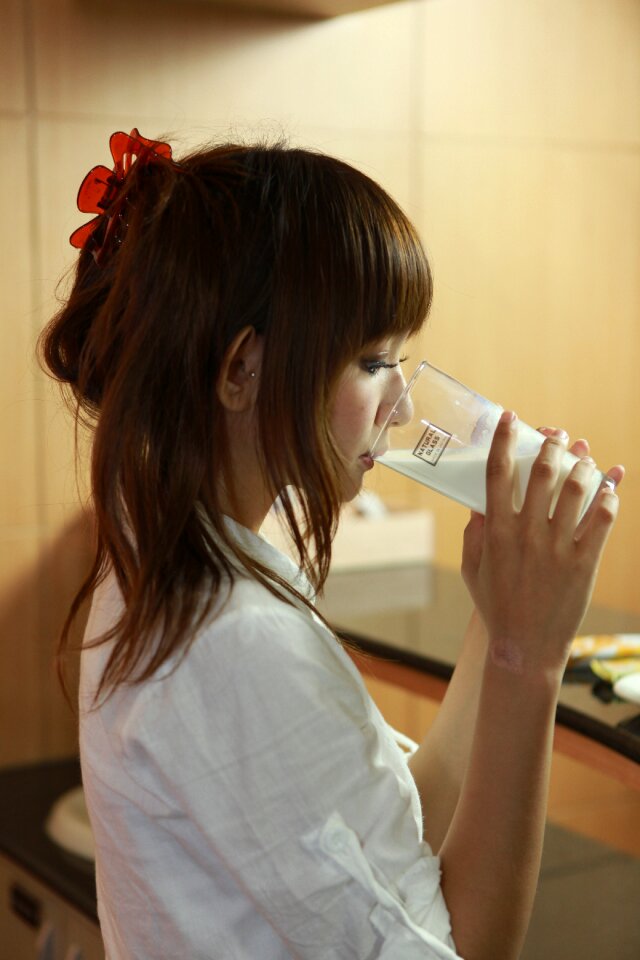 Woman girl drink milk