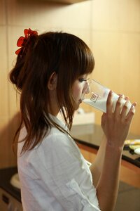 Woman girl drink milk