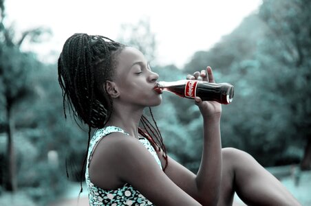 Woman girl drinking cola