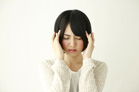 Woman girl headache photo