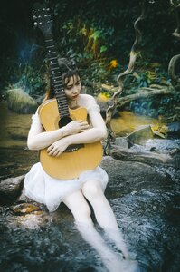 Woman girl portrait guitar photo