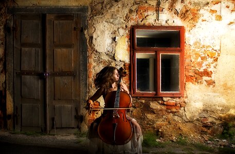 Woman playing cello music photo