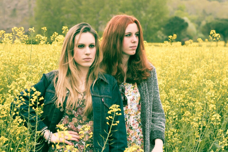 Women girls flower field