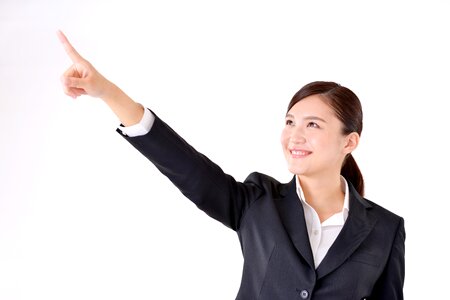 Business woman pointing