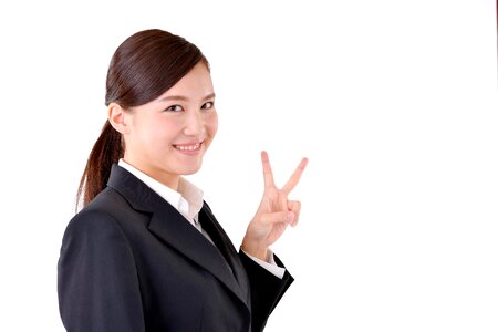 Business woman v sign