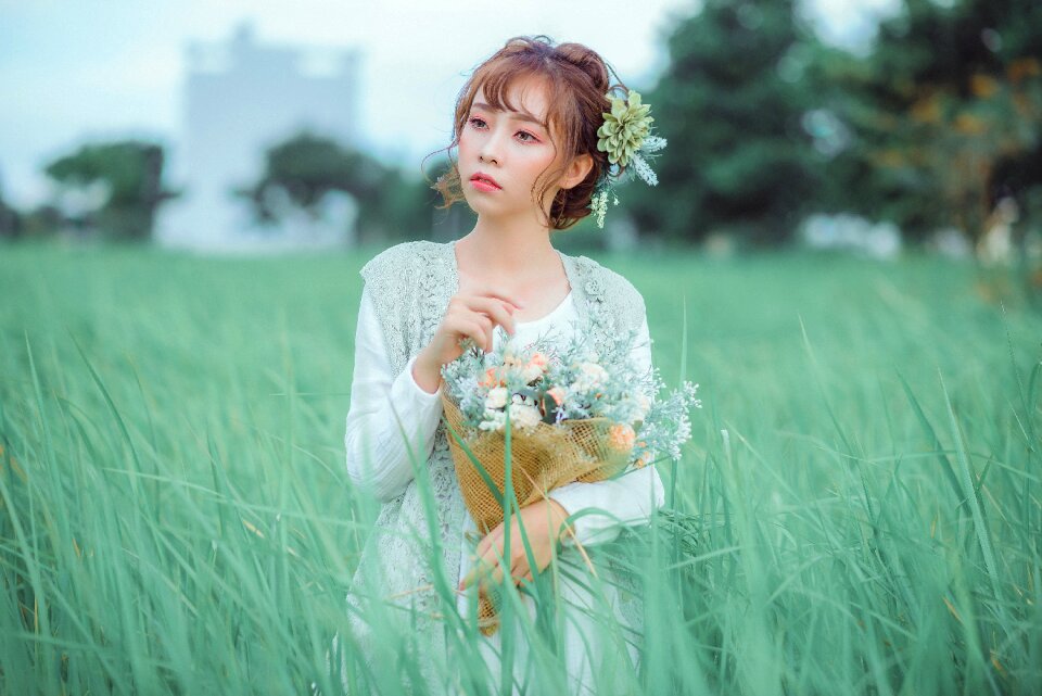 Woman girl grass bouquet