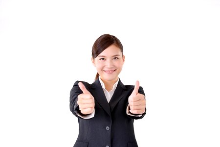 Business woman thumbs up