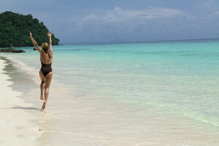 Beach sea woman joy photo