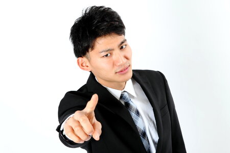 Business man pointing finger photo