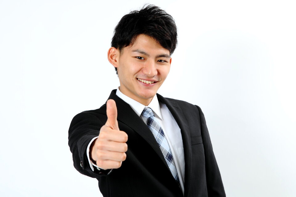 Business man thumbs up