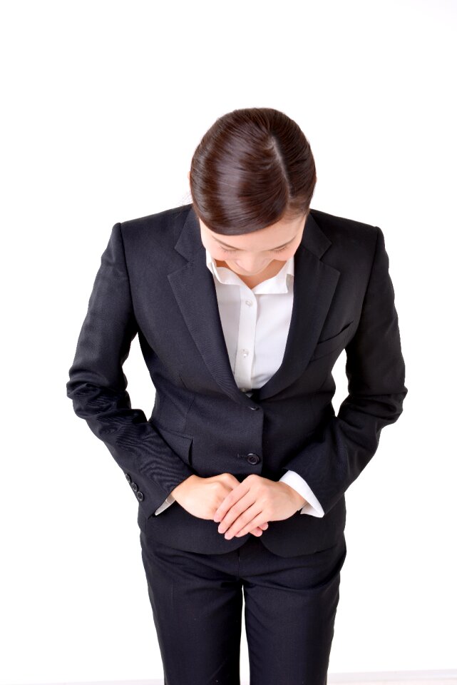 Business woman bowing
