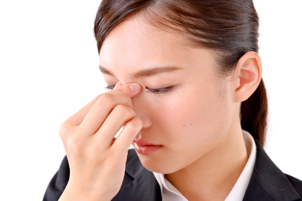 Business woman eye strain