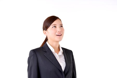 Business woman looking up photo