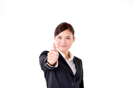 Business woman thumbs up