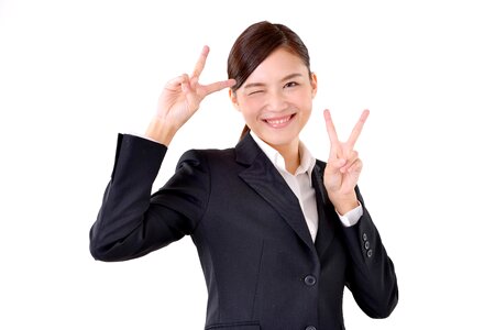 Business woman v sign photo