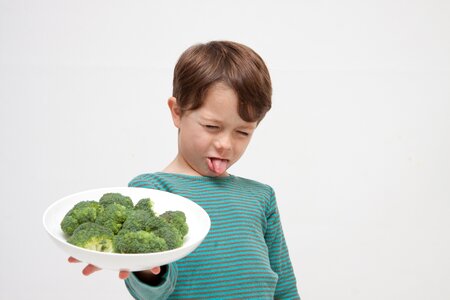Child hate broccoli photo