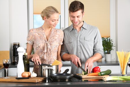 Couple cooking photo