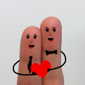 Fingers couple heart photo