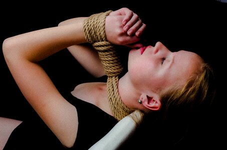 Girl binding rope photo
