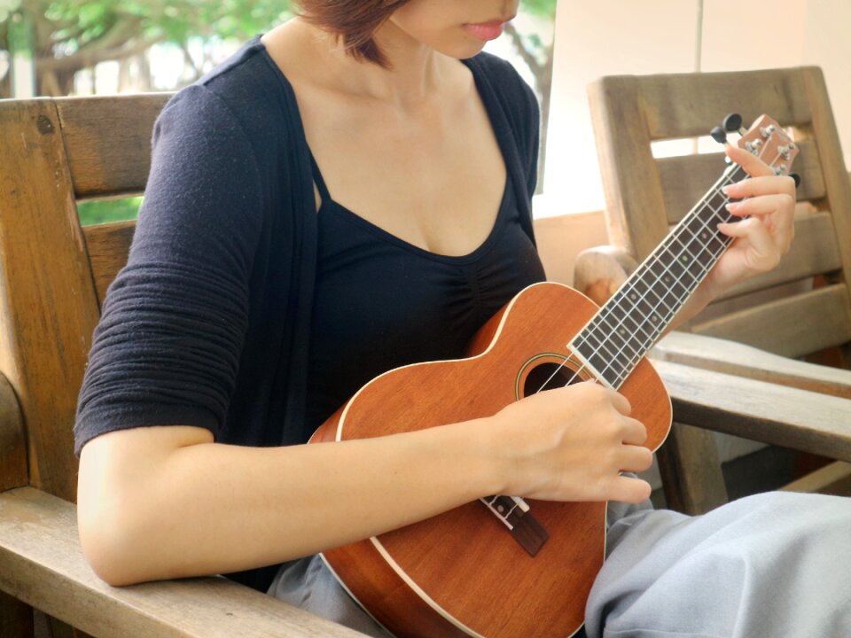 Girl playing ukulele photo