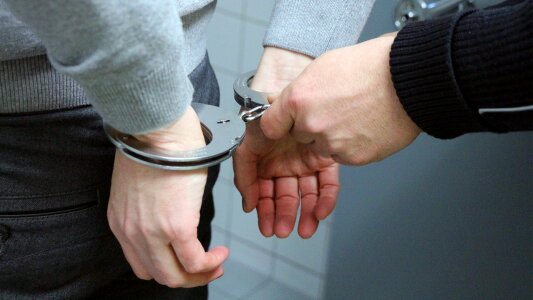 Handcuffs arrest crime photo