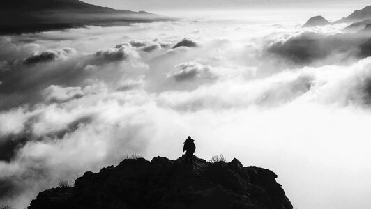 Mountain clouds climber photo