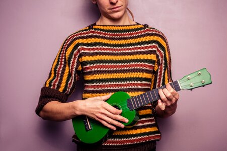 People playing ukulele