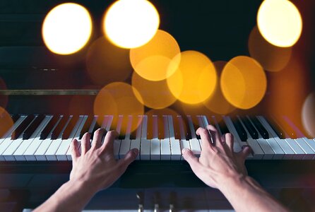 Piano playing hands photo
