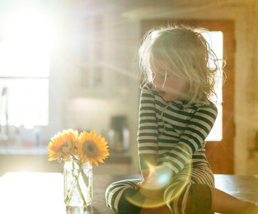 Sunbeam littke girl sunflower photo