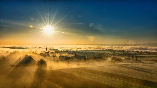 Sunrise fog countryside photo