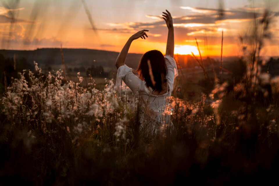 Sunset grass woman dance
