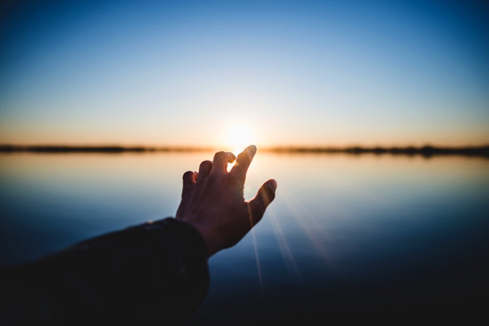 Sunset sunlight hand