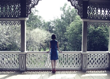 Woman balcony photo