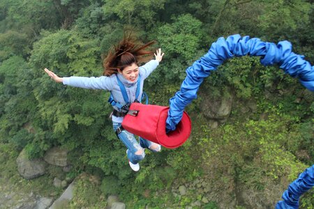 Woman bungee jumping photo