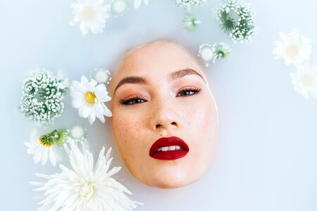 Woman face milk bath