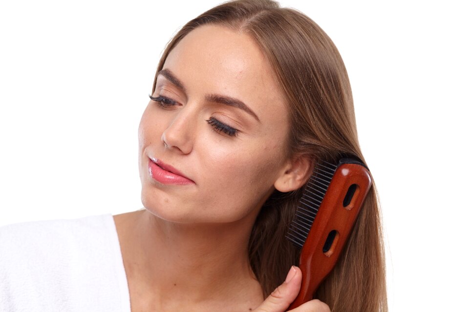 Woman girl hair brushing