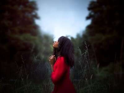 Woman girl praying photo
