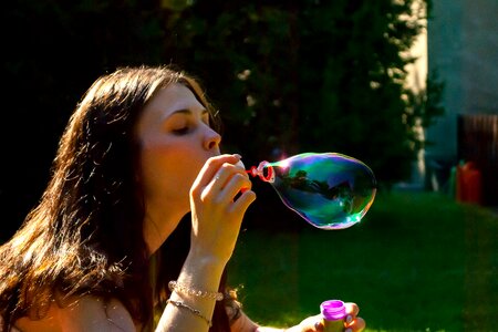 Woman girl soap bubble photo