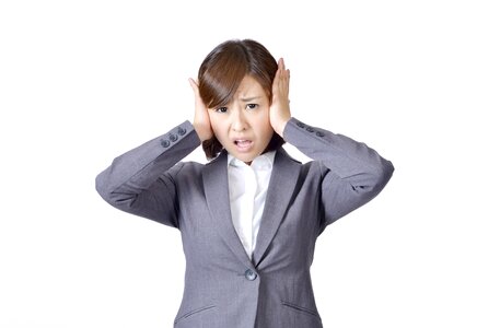 Business woman close ears