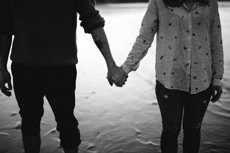 Couple holding hands
