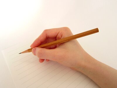 Hand pencil writing photo
