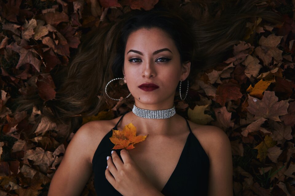 Woman girl fallen leaves