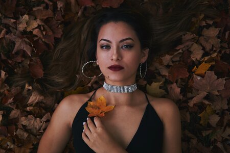 Woman girl fallen leaves