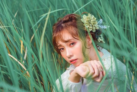 Woman girl grass bouquet